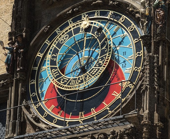a large clock on the side of a building